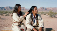A man having his hair brushed by his wife, Navajo Nation, Arizona, 1948. Photo by Leonard McCombe